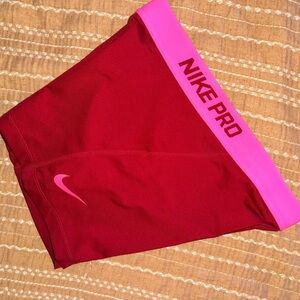 Nike Pro Women's Athletic Shorts in Red and Pink
